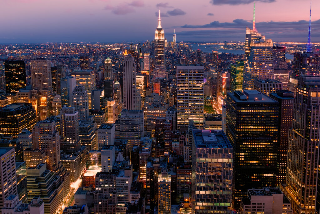 New York City skyline at dusk for couples considering a Connecticut wedding venue within driving and rail distance of Manhattan.